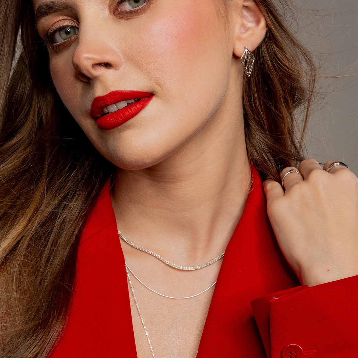 Kolczyki INFINI białe złoto