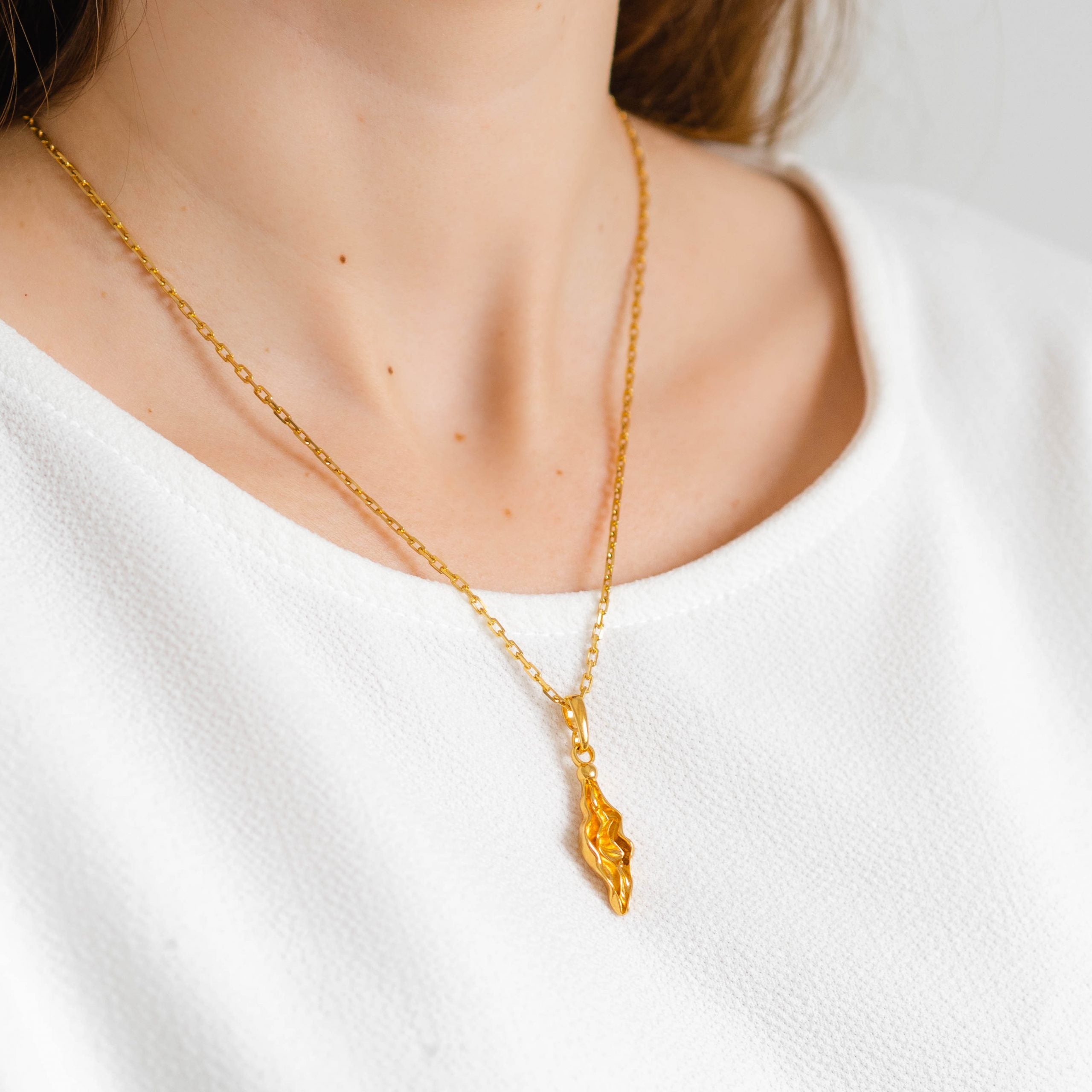 Zawieszka PUSSY srebrna pozłacana